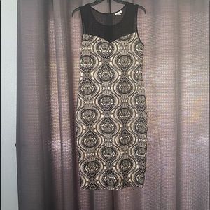 Designed by Olivia Matthews. Knee length dress size Medium